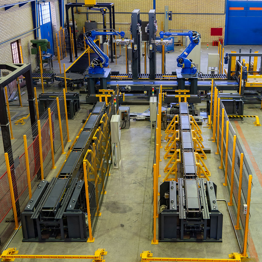 خط تولید اتوماتیک با ربات صنعتی پالتایزر در کارخانه اصفهان پک